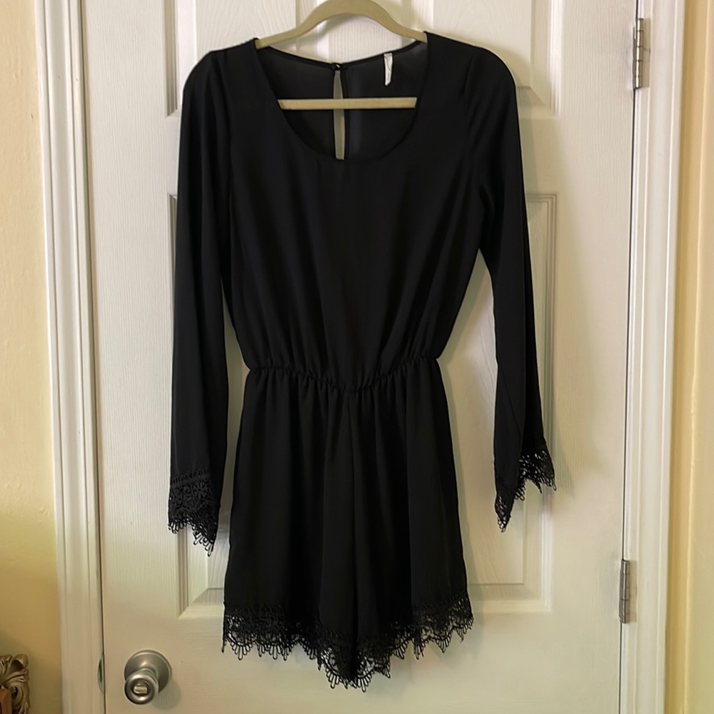 Black long sleeve romper with lace detailing